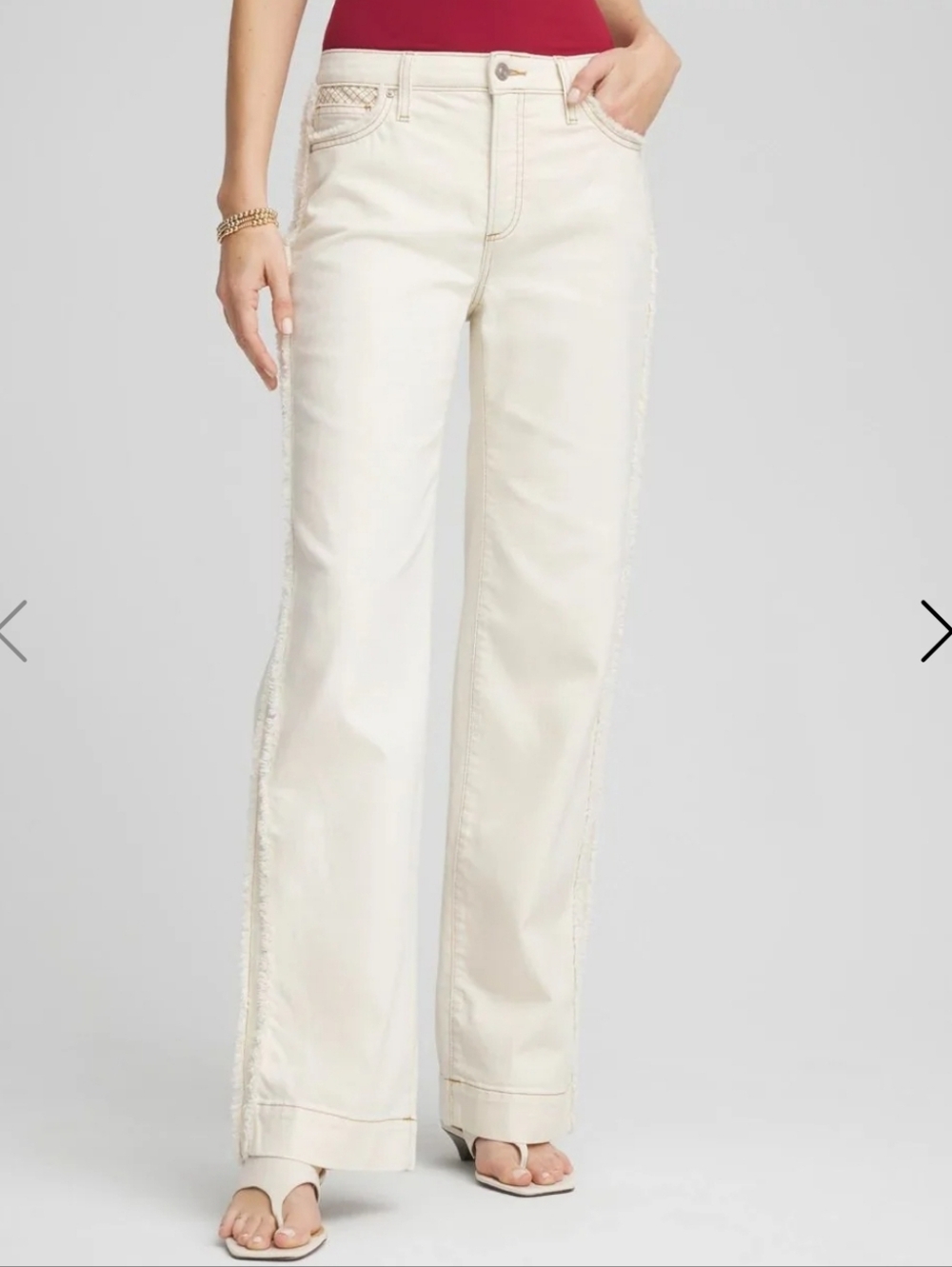 Chico's Natural Cream Straight-Leg Jeans with Frayed Side Trim And Quilted Yoke.